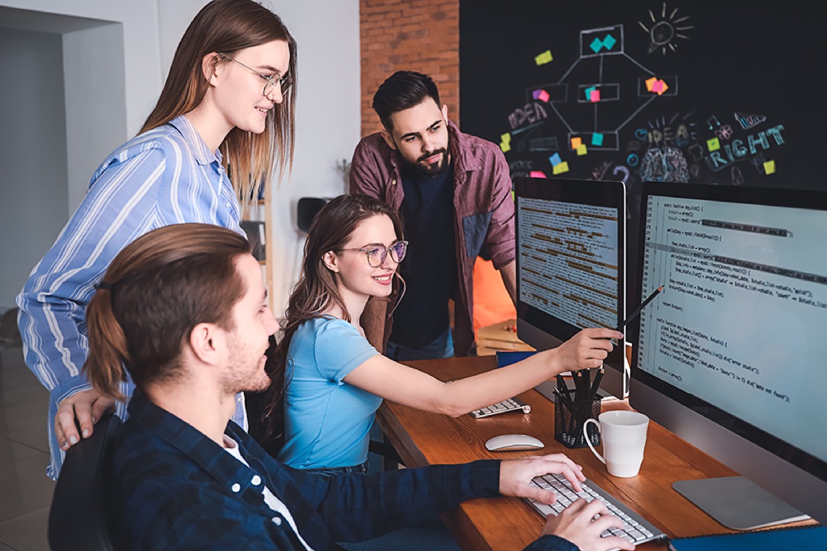 Developer team in front of computers